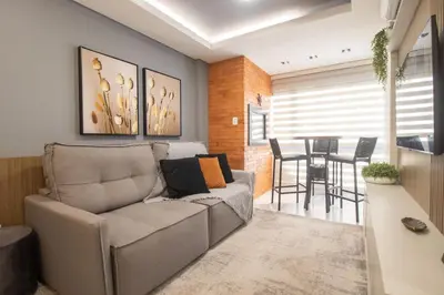 Uma área de estar em SLE72 - 2 Dorm, Climatizado, Smart TV, Barra Sul
