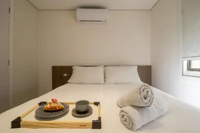 Uma cama ou camas num quarto em SLE72 - 2 Dorm, Climatizado, Smart TV, Barra Sul
