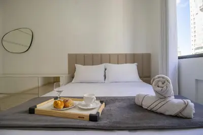 Uma cama ou camas num quarto em WIL81 - Frente para o mar; 3 Suítes, 2 Garagens