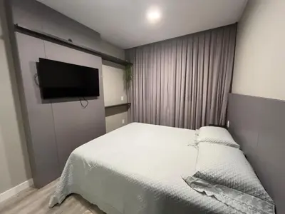 Uma cama ou camas num quarto em Apartamento Infinity Tower flat