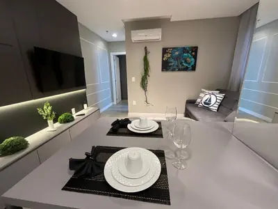 Uma televisão e/ou sistema de entretenimento em Apartamento Infinity Tower flat