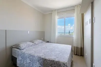 Uma cama ou camas num quarto em Apartamento Super Luxo c 3 Suites