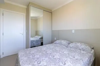 Uma cama ou camas num quarto em Apartamento Super Luxo c 3 Suites