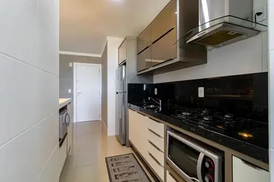 A cozinha ou kitchenette de Apartamento Super Luxo c 3 Suites