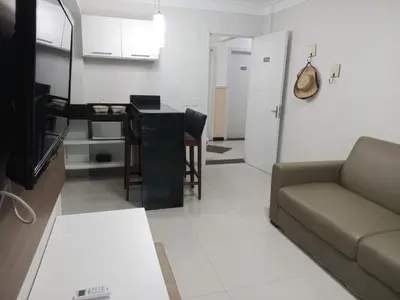 Uma televisão e/ou sistema de entretenimento em Summer praia e natureza