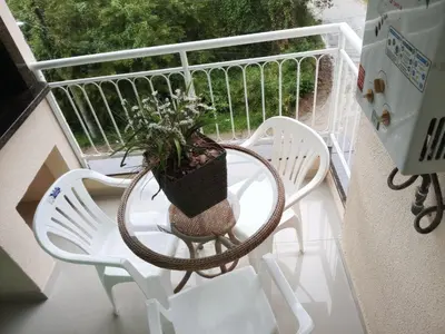 Uma varanda ou terraço em Summer praia e natureza