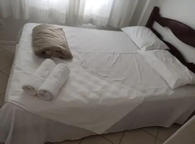 Uma cama ou camas num quarto em Apartment in paradise