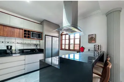 A cozinha ou kitchenette de Casa RenaPaty - Praia de Palmas