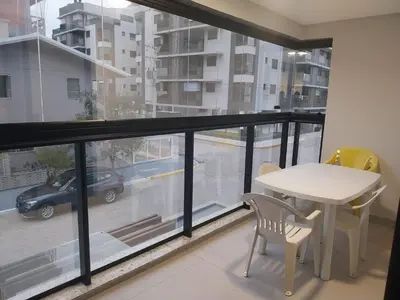 Uma varanda ou terraço em Apartamento na Praia de Palmas com 3 quartos