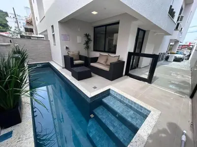 A piscina em ou perto de Apartamento na Praia de Palmas com 3 quartos