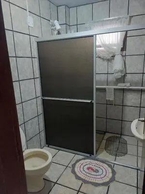 Uma casa de banho em Bercam Residencial Gavião Beach House