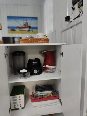 A cozinha ou kitchenette de Calheiros Beach house