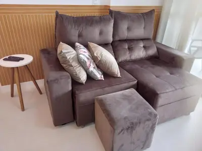 Uma área de estar em Apartamento Itapema