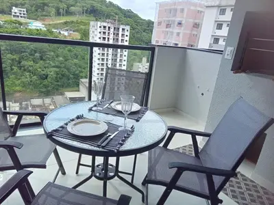 Uma varanda ou terraço em Apartamento Itapema
