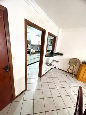 A cozinha ou kitchenette de Apartamento Meia Praia verão 2026
