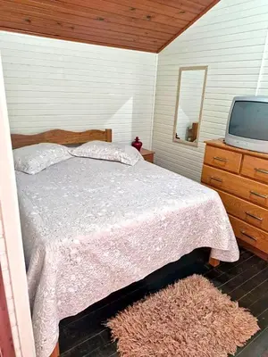 Uma cama ou camas num quarto em Casa de Praia em Palmas a 280m do Mar