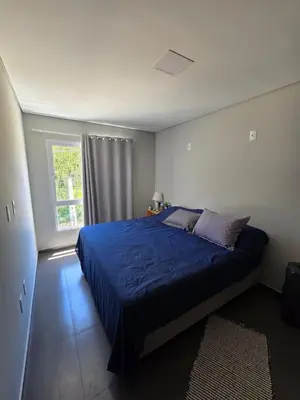 Uma cama ou camas num quarto em Duplex