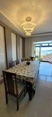 Uma área de estar em Apartamento frente Mar no Centro de Porto Belo