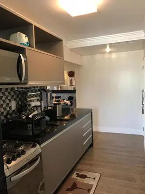A cozinha ou kitchenette de Apartamento 2 quartos todo decorado Itapema bairro Meia Praia