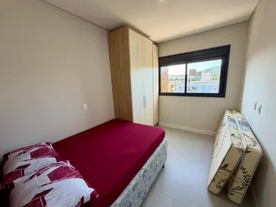 Uma cama ou camas num quarto em Recanto da Diversão