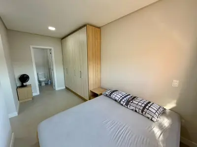 Uma cama ou camas num quarto em Recanto da Diversão