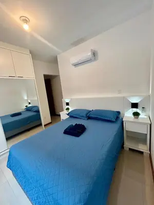 Uma cama ou camas num quarto em Apê Ásia
