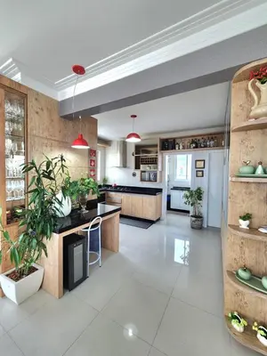 A cozinha ou kitchenette de 4 suítes com vista mar na Meia Praia