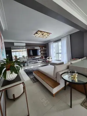 Uma cama ou camas num quarto em 4 suítes com vista mar na Meia Praia
