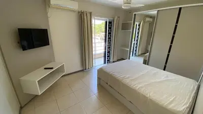 Uma cama ou camas num quarto em Casa em Mariscal 300m da praia Bombinhas