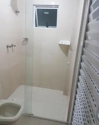 Uma casa de banho em Residencial Villa Toscana - Apartamento Bombas 100M da Praia