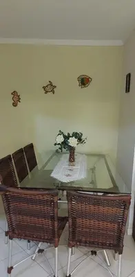 Uma área de estar em Residencial Villa Toscana - Apartamento Bombas 100M da Praia