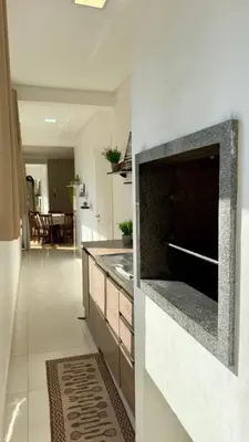 A cozinha ou kitchenette de Apartamento em Meia Praia - Recanto da Maré