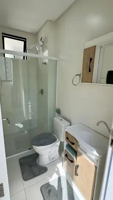 Uma casa de banho em Apartamento em Meia Praia - Recanto da Maré