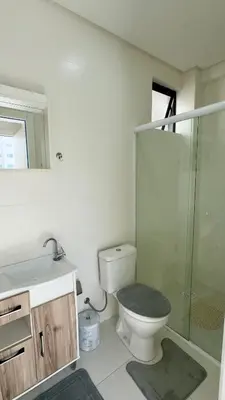 Uma casa de banho em Apartamento em Meia Praia - Recanto da Maré
