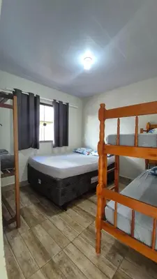 Uma cama ou camas num quarto em Residencial Canto da Maré