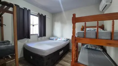 Uma cama ou camas num quarto em Residencial Canto da Maré