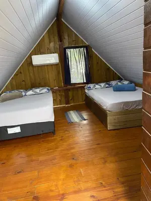 Uma cama ou camas num quarto em Cabana Canto da Maré