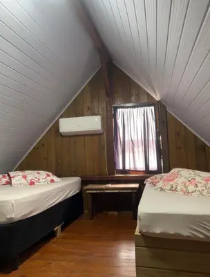 Uma cama ou camas num quarto em Cabana Canto da Maré