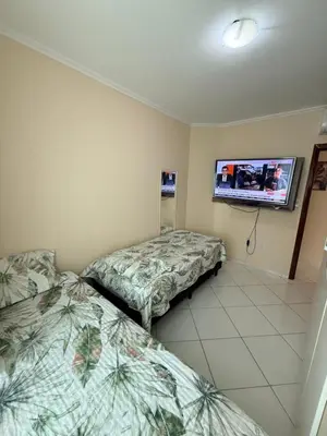 Uma cama ou camas num quarto em Departamento Brasil