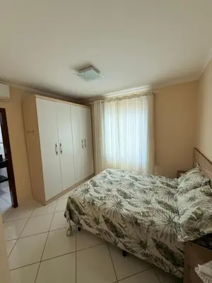 Uma cama ou camas num quarto em Departamento Brasil