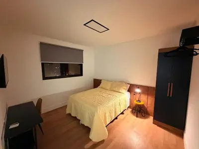Uma cama ou camas num quarto em Itapema Vista Mar