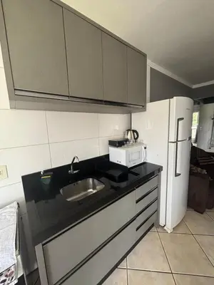 A cozinha ou kitchenette de Casa em itapema fácil acesso e bem localizada