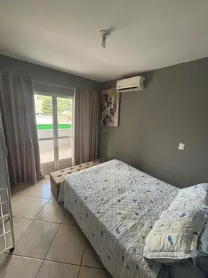 Uma cama ou camas num quarto em Casa em itapema fácil acesso e bem localizada