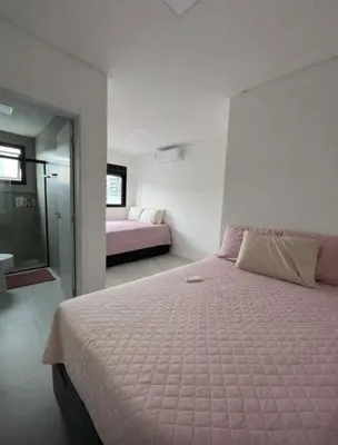 Uma cama ou camas num quarto em Apartamento 400 metro distancia da Praia de Palmas - Governador Celso Ramos