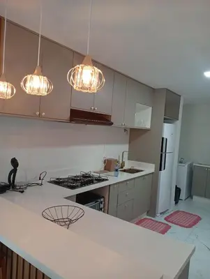 A cozinha ou kitchenette de High standard apartment with walking access to Meia Praia