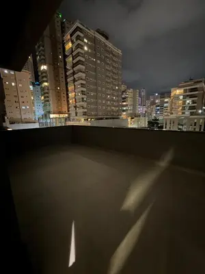 Uma vista geral de Itapema ou a vista da cidade a partir do apartamento