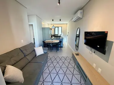 Uma televisão e/ou sistema de entretenimento em Charme e Conforto Seu Cantinho em Palmas