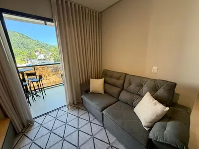 Uma área de estar em Charme e Conforto Seu Cantinho em Palmas