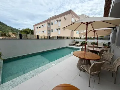 A piscina em ou perto de Charme e Conforto Seu Cantinho em Palmas