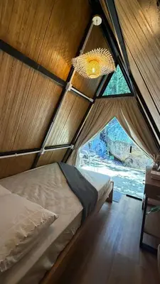 Uma cama ou camas num quarto em Cabana no Morro do Macaco